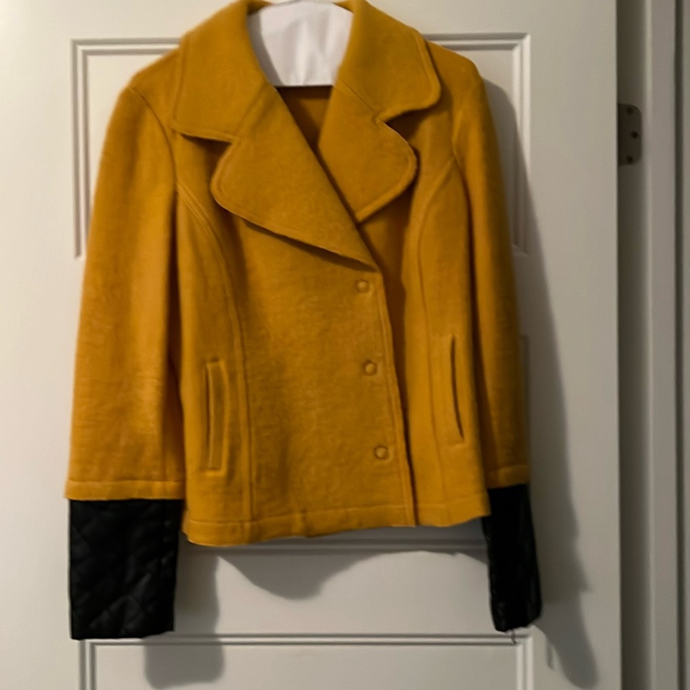 Mustard yellow boiled wool jacket. Snap buttons and leather halfway sleeves